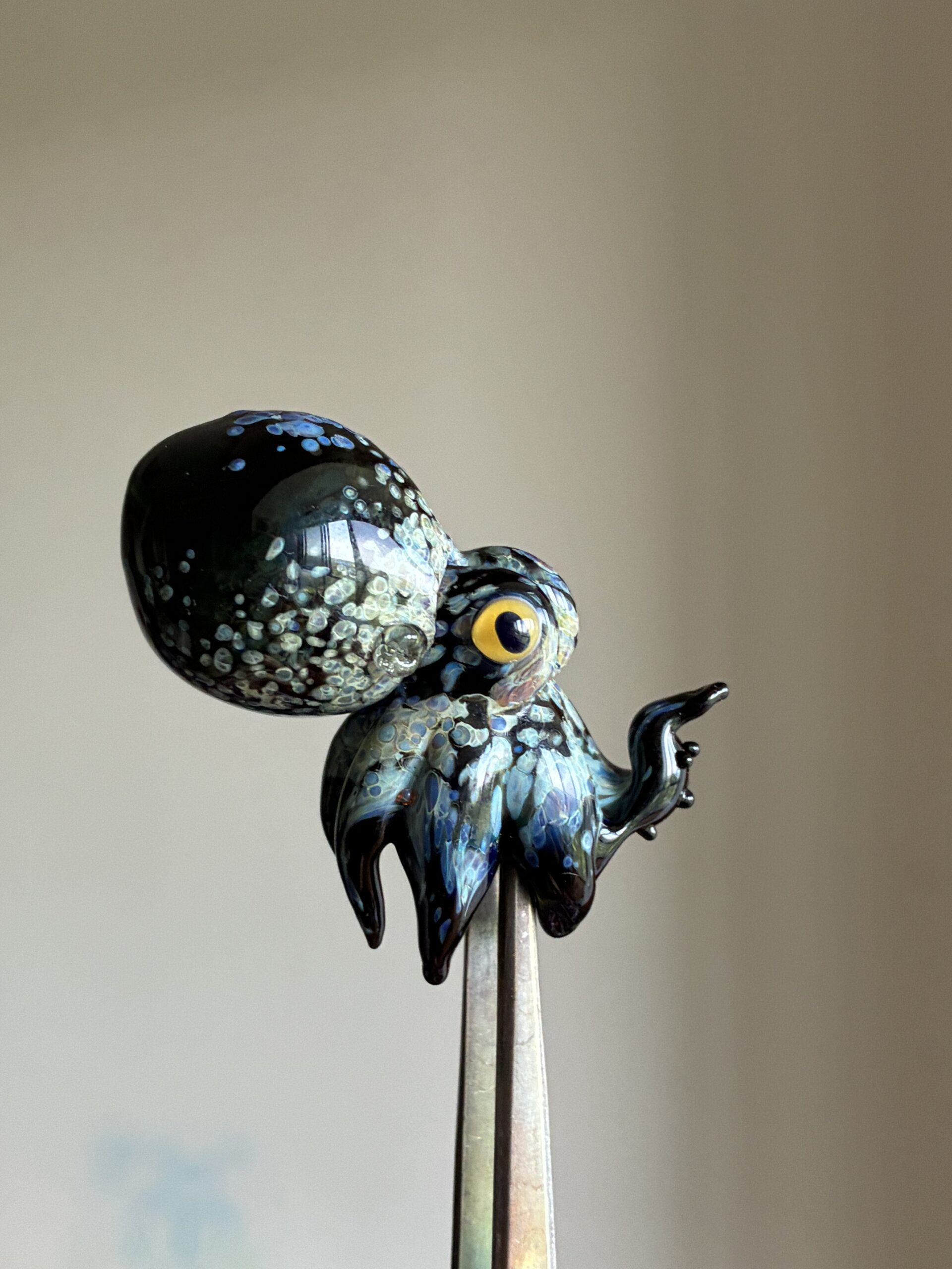 “Lampworked glass octopus, custom-made by Green Flame.”