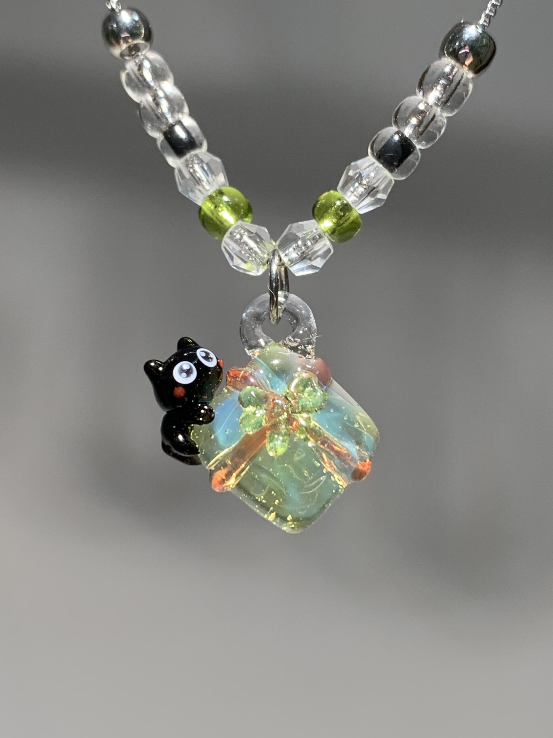 Handmade Glass Black Cat Necklace - Iridescent Cube with Flower Pendant